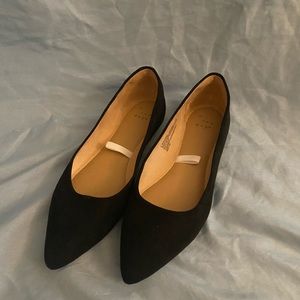 Black pointed flats